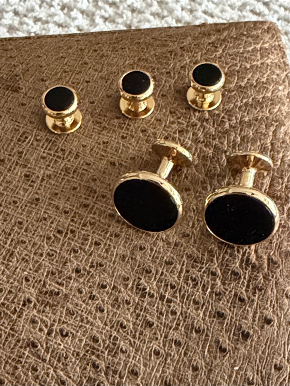 Set of black onyx and gold plated cuff links and matching tuxedo buttons